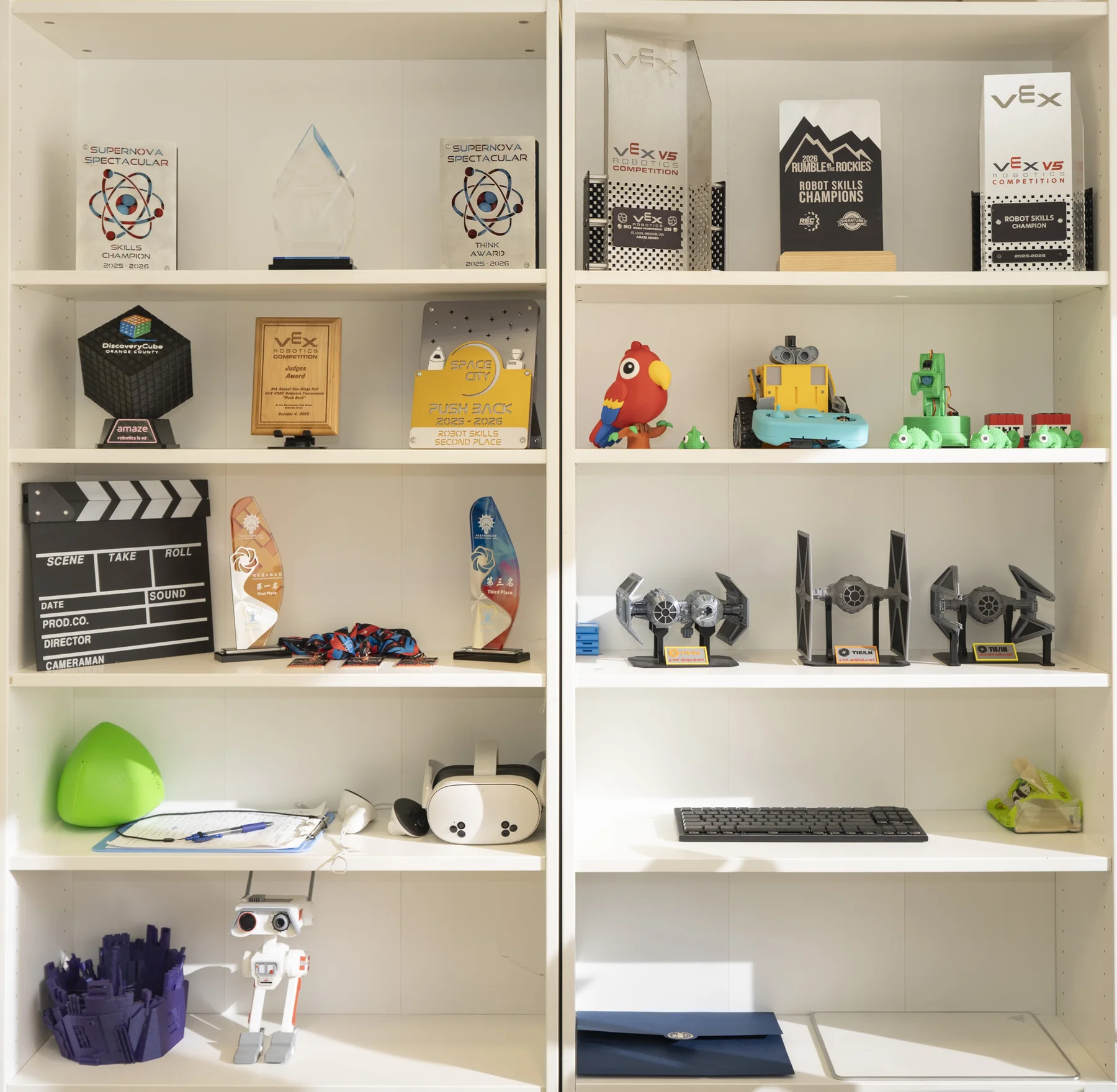 The display shelf, with awards, 3D prints and robot builds.